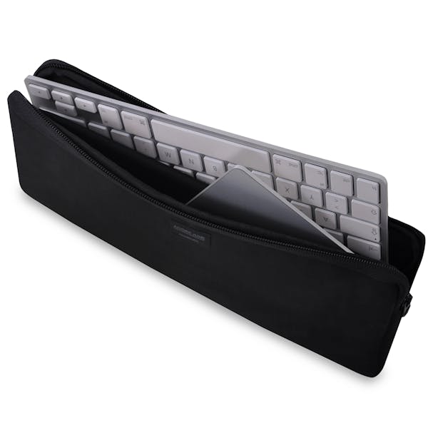 The picture shows the front of Keeb Combine Sleeve for Magic Keyboard and Magic Trackpad in color Black; As an illustration, it also shows what the compatible device looks like in this bag