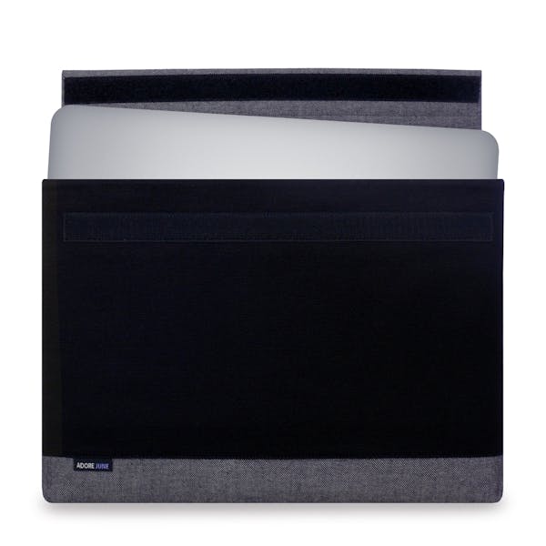 The picture shows the front of Bold Sleeve for Dell XPS 15 in color Grey / Black; As an illustration, it also shows what the compatible device looks like in this bag
